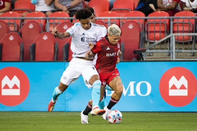 August 14, 2021, Toronto, Ontario, Canada: Yeferson Soteldo (30) and Tajon Buchanan (17) in action during the MLS, Fussball Herren, USA game between between Toronto FC and New England Revolution at BMO field. Toronto Canada - ZUMAs197 20210814_zaa_s197_325 Copyright: xAngelxMarchinix