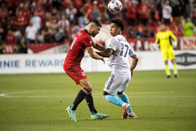 August 14, 2021, Toronto, Ontario, Canada: Jonathan Osorio (21) and Tajon Buchanan (17) in action during the MLS, Fussball Herren, USA game between between Toronto FC and New England Revolution at BMO field. Toronto Canada - ZUMAs197 20210814_zaa_s197_348 Copyright: xAngelxMarchinix