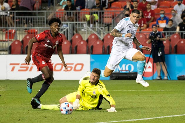 August 14, 2021, Toronto, Ontario, Canada: Ralph Priso-Mbongue (97), Alex Bono (25) and Gustavo Bou (7) in action during the MLS, Fussball Herren, USA game between between Toronto FC and New England Revolution at BMO field. Toronto Canada - ZUMAs197 20210814_zaa_s197_364 Copyright: xAngelxMarchinix