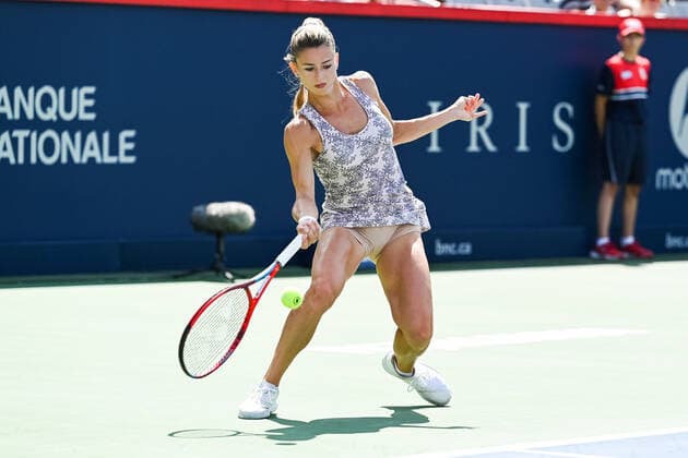 August 15, 2021: Camila Giorgi (ITA) returns the ball during the WTA, Tennis Damen National Bank Open final match at IGA Stadium in Montreal, Quebec. CSM Montreal Canada - ZUMAc04_ 20210815_zaf_c04_028 Copyright: xDavidxKirouacx