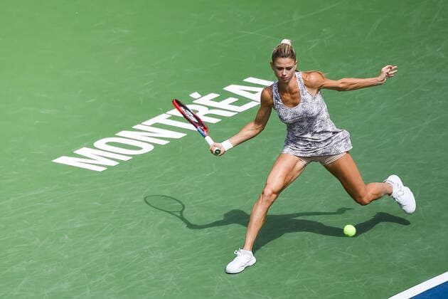 MONTREAL, QC - AUGUST 15: Camila Giorgi (ITA) returns the ball during the final WTA, Tennis Damen National Bank Open match on August 15, 2021 at IGA Stadium in Montreal, QC (Photo by David Kirouac Icon Sportswire) TENNIS: AUG 15 National Bank Open Icon210815011