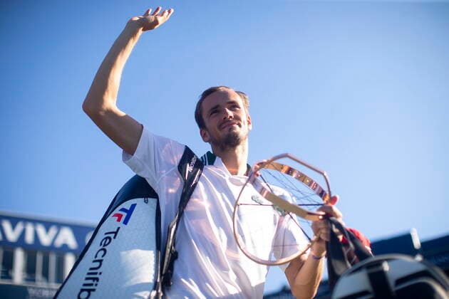 August 15, 2021, TORONTO, ON, CAN: Russia s Daniil Medvedev holds the trophy as he waves to fans while walking off the court after beating Reilly Opelka, of the United States, 6-4, 6-3 to win the National Bank Open men s final in Toronto, Sunday, Aug. 15, 2021. Daniil Medvedev - ZUMAc35_ 20210815_zaf_c35_120 Copyright: xChrisxYoungx