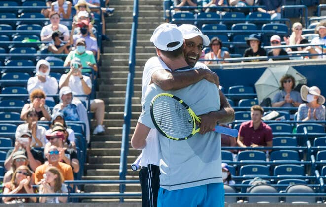 (210816) -- TORONTO, Aug. 16, 2021 -- Rajeev Ram of the United States and Joe Salisbury (front) of Britain celebrate victory after the men s doubles final against Mate Pavic and Nikola Mektic of Croatia at the 2021 National Bank Open in Toronto, Canada, on Aug. 15, 2021. (Photo by Xinhua) (SP)CANADA-TORONTO-TENNIS-NATIONAL BANK OPEN-MEN S DOUBLES-FINAL ZouxZheng 