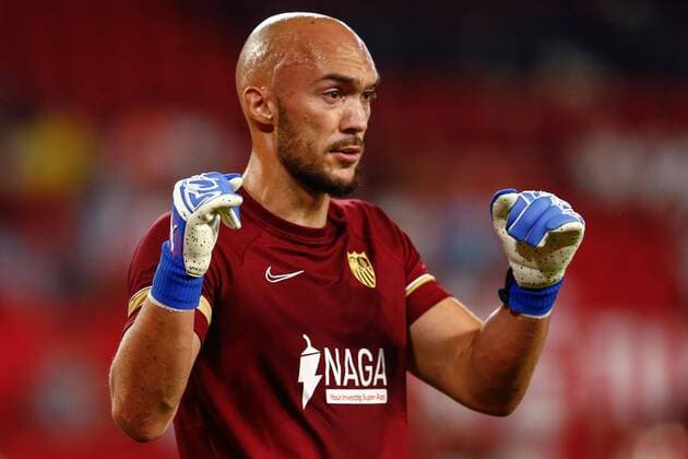 Mandatory Credit: Photo by Pressinphoto Shutterstock (12293506y) Marko Dmitrovic of Sevilla FC Sevilla FC v Rayo Vallecano, La Liga 2021-2022, date 1. Football, Sanchez Pizjuan Stadium, Sevilla, Spain - 15 AUG 2021 EDITORIAL USE ONLY No use with unauthorised audio, video, data, fixture lists (outside the EU), club league logos or live services. Online in-match use limited to 45 images (+15 in extra time). No use to emulate moving images. No use in betting, games or single club league player publications services. Sevilla FC v Rayo Vallecano, La Liga 2021-2022, date 1. Football, Sanchez Pizjuan Stadium, Sevilla, Spain - 15 AUG 2021 EDITORIAL USE ONLY No use with unauthorised audio, video, data, fixture lists (outside the EU), club league logos or live services. Online in-match use limited to 45 images (+15 in extra time). No use to emulate moving images. No use in betting, games or Copyright: xPressinphoto Shutterstockx 12293506y