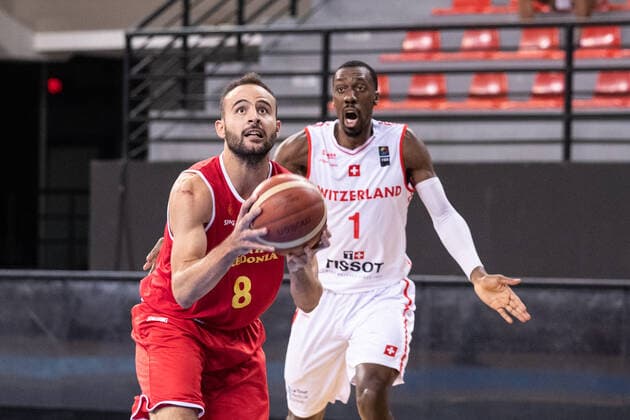 16.08.2021, Skoplje, Jane Sandanski Arena, World Cup European Pre-Qualifiers: Switzerland - North Macedonia, 8 Damjan Robev (North Macedonia) against Michel-Ofik Nzege (Switzerland) Skoplje Skoplje Nordmazedonien Copyright: xJustPictures.ch NikolaxKrsticx
