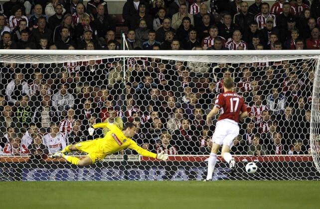 Mandatory Credit: Photo by Back Page Images Shutterstock (1225673e) Stoke City goalkeeper Thomas Sorensen fails to stop Stewart Downing of Aston Villa (not pictured) from scoring the opening goal of the game Stoke City v Aston Villa, FA Premier League football match, Britannia Stadium, Britain - 13 Sep 2010 Stoke beat Villa 2-1 EDITORIAL USE ONLY No use with unauthorised audio, video, data, fixture lists (outside the EU), club league logos or live services. Online in-match use limited to 45 images (+15 in extra time). No use to emulate moving images. No use in betting, games or single club league player publications services. Stoke City v Aston Villa, FA Premier League football match, Britannia Stadium, Britain - 13 Sep 2010 EDITORIAL USE ONLY No use with unauthorised audio, video, data, fixture lists (outside the EU), club league logos or live services. Online in-match use limited to 45 images (+15 in extra time). No use to emulate moving images. No use in betting, games or  Copyright: xBackxPagexImages Shutterstockx 1225673e