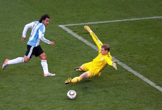 Mandatory Credit: Photo by Back Page Images Shutterstock (1202922h) Carlos Tevez of Argentina and Manuel Neuer of Germany Argentina v Germany, 2010 FIFA World Cup, WM, Weltmeisterschaft, Fussball football quarter final match, Green Point Stadium, Cape Town, South Africa - 03 Jul 2010 Germany beat Argentina 4-0 EDITORIAL USE ONLY Argentina v Germany, 2010 FIFA World Cup football quarter final match, Green Point Stadium, Cape Town, South Africa - 03 Jul 2010 EDITORIAL USE ONLY  Copyright: xBackxPagexImages Shutterstockx 1202922h