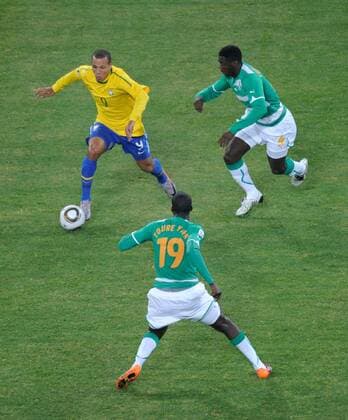 Mandatory Credit: Photo by Back Page Images Shutterstock (1198651ac) Luis Fabiano of Brazil tries to find a way around brothers Kolo Toure and Yaya Toure of Ivory Coast Brazil v Ivory Coast, 2010 FIFA World Cup, WM, Weltmeisterschaft, Fussball football match, Soccer City, Johannesburg, South Africa - 20 Jun 2010 Brazil beat Ivory Coast 3-1 EDITORIAL USE ONLY Brazil v Ivory Coast, 2010 FIFA World Cup football match, Soccer City, Johannesburg, South Africa - 20 Jun 2010 EDITORIAL USE ONLY  Copyright: xBackxPagexImages Shutterstockx 1198651ac