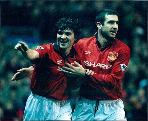 Mandatory Credit: Photo by Jim Hutchison ANL Shutterstock (1334771a) Football 1995 96: Premier League - Manchester United, ManU 2 V Everton 0. Man Utd s Royal Keane And Eric Cantona. Football 1995 96: Premier League - Manchester United 2 V Everton 0. Man Utd s Royal Keane And Eric Cantona. EDITORIAL USE ONLY No use with unauthorised audio, video, data, fixture lists (outside the EU), club league logos or live services. Online in-match use limited to 45 images (+15 in extra time). No use to emulate moving images. No use in betting, games or single club league player publications services. Football 1995 96: Premier League - Manchester United 2 V Everton 0. Man Utd s Royal Keane And Eric Cantona. EDITORIAL USE ONLY No use with unauthorised audio, video, data, fixture lists (outside the EU), club league logos or live services. Online in-match use limited to 45 images (+15 in extra time). No use to emulate moving images. No use in betting, games or Copyright: xJimxHutchison ANL Shutterstockx 1334771a