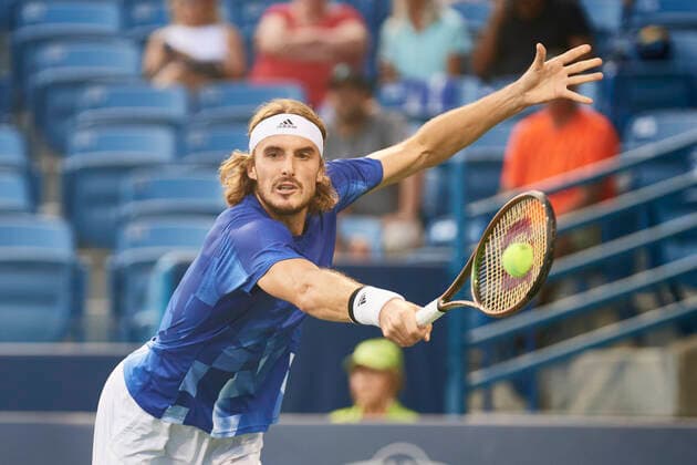 CINCINNATI, OH - AUGUST 19: Stefanos Tsitsipas of Greece blocks a serve during the match on day 4 of the Western & Southern Open at the Lindner Family Tennis Center in Mason, Ohio on August 19, 2021. (Photo by Shelley Lipton Icon Sportswire) TENNIS: AUG 19 Western & Southern Open Icon2108191994