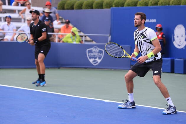 CINCINNATI, OH - AUGUST 20: Austin Krajicek of the United States (right) waits for the serve alongside Steve Johnson of the United States during the Western & Southern Open at the Lindner Family Tennis Center on August 20, 2021 in Mason, Ohio. (Photo by Ian Johnson Icon Sportswire) TENNIS: AUG 20 Western & Southern Open Icon210820037