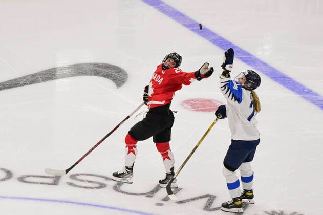August 20, 2021, Calgary, AB, Canada: Canada s MARIE-PHILIP POULIN (left) and Finland s JENNIINA NYLUND try and bat the puck out of the air during the Finland vs Canada preliminary round game at the 2021 IIHF Women s World Championship, WM, Weltmeisterschaft in Calgary, AB, Canada on Aug 20, 2021. Canada defeated Finland 5-3. The 12-day tournament returns after more than two year due to the COVID-19 pandemic. Calgary Canada - ZUMAj113 20210820_zip_j113_047 Copyright: xGavinxJohnx