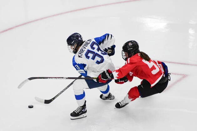 August 20, 2021, Calgary, AB, Canada: Canada s VICTORIA BACH (right) battles Finland s MICHELLE KARVINEN (left) for the puck during the Finland vs Canada preliminary round game at the 2021 IIHF Women s World Championship, WM, Weltmeisterschaft in Calgary, AB, Canada on Aug 20, 2021. Canada defeated Finland 5-3. The 12-day tournament returns after more than two year due to the COVID-19 pandemic. Calgary Canada - ZUMAj113 20210820_zip_j113_077 Copyright: xGavinxJohnx