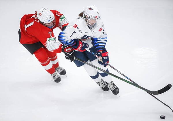 August 20, 2021, Calgary, ab, Canada: Megan Keller, right, of the United States, tries to get past Switzerland s Lena Marie Lutz during third period IIHF Women s World Championship, WM, Weltmeisterschaft hockey action in Calgary, Friday, Aug. 20, 2021. Lena Marie Lutz, Megan Keller,  - ZUMAc35_ 20210820_zaf_c35_093 Copyright: xJeffxMcintoshx