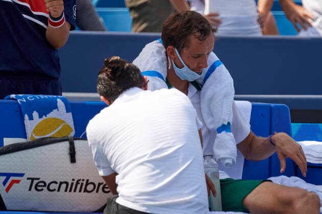 CINCINNATI, OH - AUGUST 21: Daniil Medvedev of Russia takes a second medical timeout during the semifinal match on day 7 of the Western & Southern Open at the Lindner Family Tennis Center in Mason, Ohio on August 21, 2021. (Photo by Shelley Lipton Icon Sportswire) TENNIS: AUG 21 Western & Southern Open Icon2108211153
