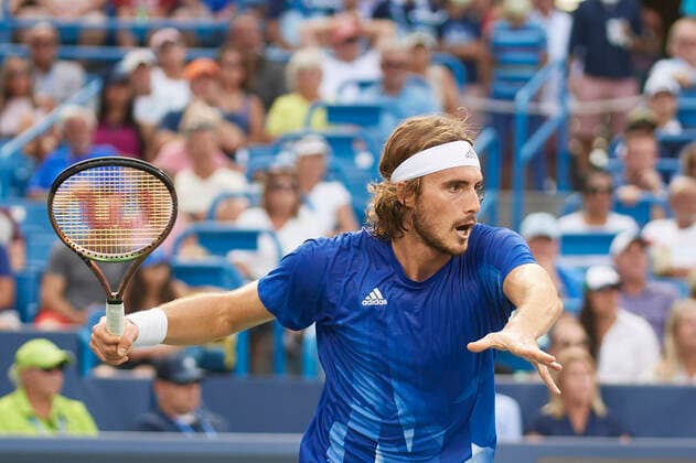 CINCINNATI, OH - AUGUST 21: Stefanos Tsitsipas of Greece hits a forehand shot during the semifinal match on day 7 of the Western & Southern Open at the Lindner Family Tennis Center in Mason, Ohio on August 21, 2021. (Photo by Shelley Lipton Icon Sportswire) TENNIS: AUG 21 Western & Southern Open Icon2108211617