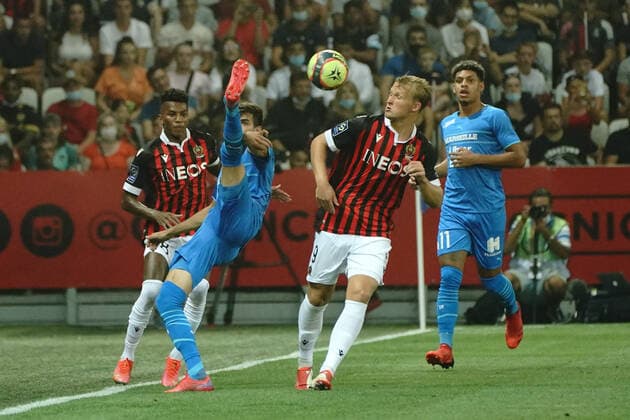 Kasper Dolberg (OGC Nice) - Luan Peres (Olympique de Marseille) FOOTBALL : OGC Nice vs Olympique de Marseille - Ligue 1 Uber Eats - Nice - 22 08 2021 NorbertScanella PanoramiC 