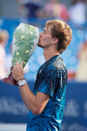 CINCINNATI, OH - AUGUST 22: Alexander Zverev of Germany kisses the Rookwood Cup after winning the menÕs championship match of the Western & Southern Open at the Lindner Family Tennis Center in Mason, Ohio on August 22, 2021. Zverev defeated Andrey Rublev of Russia 6-2, 6-3. (Photo by Shelley Lipton Icon Sportswire) TENNIS: AUG 22 Western & Southern Open Icon2108221278