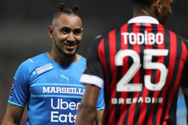 Nice, France, 22nd August 2021. Dimitri Payet of Olympique De Marseille smiles with Jean-Clair Todibo of OGC Nice during the Lique 1 match at Allianz Riviera Stadium, Nice. Picture credit should read: Jonathan Moscrop Sportimage EDITORIAL USE ONLY. No use with unauthorised audio, video, data, fixture lists, club league logos or live services. Online in-match use limited to 120 images, no video emulation. No use in betting, games or single club league player publications. SPI-1148-0118