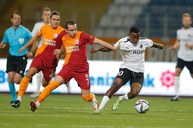 Randers Tosin Kehinde vies for the ball with Galatasaray s Kerem Akturkoglu during the UEFA Europa League play-off second leg football match between Galatasaray and Randers at Recep Tayyip Erdogan Stadium in Istanbul, on August 26, 2021.. , Istanbul Denmark