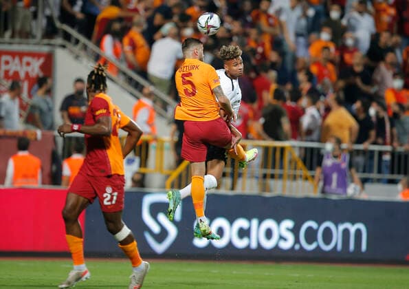 Randers Marvin Egho vies for the ball with Galatasaray s Alpaslan Ozturk during the UEFA Europa League play-off second leg football match between Galatasaray and Randers at Recep Tayyip Erdogan Stadium in Istanbul, on August 26, 2021.. , Istanbul Denmark