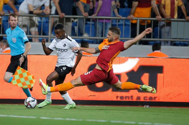 Randers Tosin Kehinde vies for the ball with Galatasaray s Alpaslan Ozturk during the UEFA Europa League play-off second leg football match between Galatasaray and Randers at Recep Tayyip Erdogan Stadium in Istanbul, on August 26, 2021.. , Istanbul Denmark