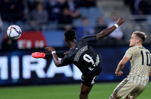 SOCCER - UEFA EL, Sturm vs Mura GRAZ,AUSTRIA,26.AUG.21 - SOCCER - UEFA Europa League play off, SK Sturm Graz vs NS Mura. Image shows Kelvin Yeboah (Sturm) and Tomi Horvat (Mura).  GEPAxpictures xHansxOberlaender