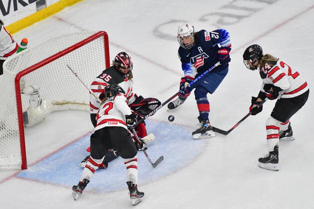 August 26, 2021, Calgary, AB, Canada: JILARY KNIGHT (centre) from The United States shoots the puck on the Canadian net during the Canada vs United States preliminary round game at the 2021 IIHF Women s World Championship, WM, Weltmeisterschaft in Calgary, AB, Canada on 26 August, 2021. Canada defeated the United States 5-1 to take first place in the preliminary round. The last time Canada beat the United States at the World Championship was in 2013. Calgary Canada - ZUMAj113 0131781016st Copyright: xGavinxJohnx