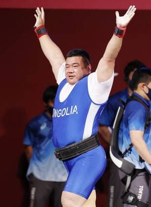 Tokyo Paralympics: Powerlifting Mongolia s Sodnompiljee Enkhbayar reacts after lifting 245 kilograms in the men s powerlifting 107-kilogram event at the Tokyo Paralympics on Aug. 30, 2021, at Tokyo International Forum. He won gold.  A14AA0000778592P