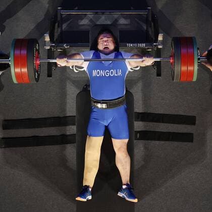 Tokyo Paralympics: Powerlifting Mongolia s Sodnompiljee Enkhbayar lifts 245 kilograms in the men s powerlifting 107-kilogram event at the Tokyo Paralympics on Aug. 30, 2021, at Tokyo International Forum. He won gold.  A14AA0000778593P