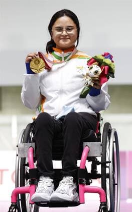 Tokyo Paralympics: Shooting India s Avani Lekhara poses with her gold medal for the women s SH1 10-meter air rifle standing at the Tokyo Paralympics on Aug. 30, 2021, at Asaka Shooting Range.  A14AA0000778596P