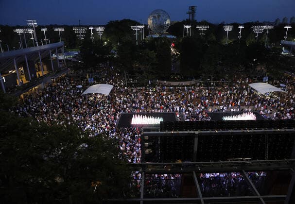Crowds gather and wait to enter Arthur Ashe Stadium for the night session in the first round of the 2021 US Open Tennis Championships at the USTA Billie Jean King National Tennis Center on Monday, August 30, 2021 in New York City.  NYP20210830153 JOHNxANGELILLO