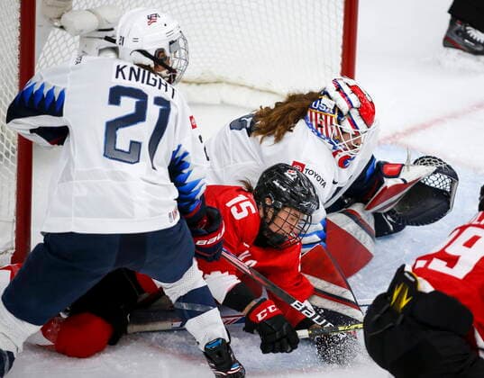 August 31, 2021, Calgary, ab, Canada: Canada s Melodie Daoust, centre, is checked by Hilary Knight, left, of the United States, into goalie Nicole Hensley during second period gold medal final IIHF Women s World Championship, WM, Weltmeisterschaft hockey action in Calgary, Tuesday, Aug. 31, 2021. Melodie Daoust, Nicole Hensley, Hilary Knight, - ZUMAc35_ 20210831_zaf_c35_078 Copyright: xJeffxMcintoshx