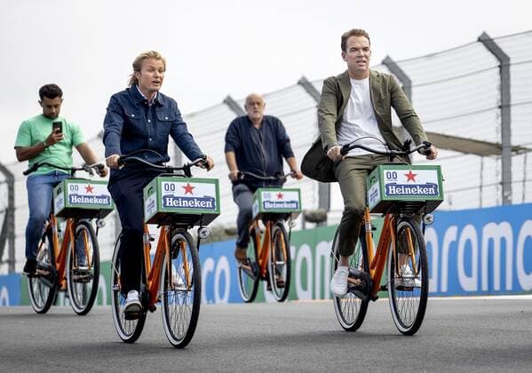 ZANDVOORT - Nico Rosberg and Robert Doornbos cycle over the circuit. For the first time in 36 years, the Formula 1 race Dutch Grand Prix Zandvoort will be held at Circuit Zandvoort. KOEN VAN WEEL xVIxANPxSportx xxANPxIVx