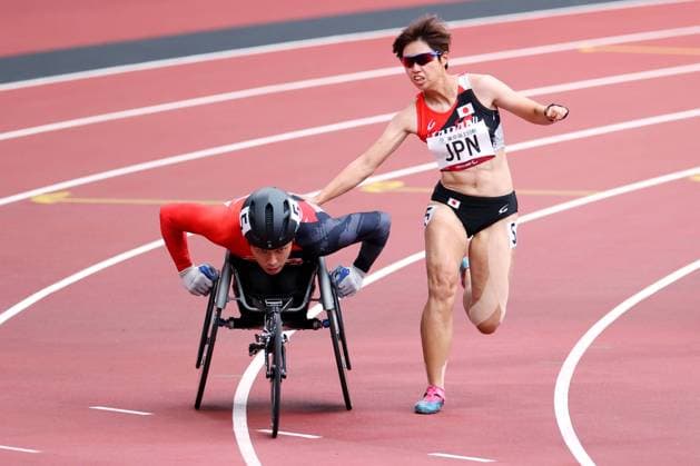 Sport Bilder des Tages (L-R) Tomoki Suzuki, Yuka Takamatsu (JPN), September 3, 2021 - Athletics : 4x100m Universal Relay Round1 during the Tokyo 2020 Paralympic Games at the National Stadium in Tokyo, Japan. Noxthirdxpartyxsales  (168465475)