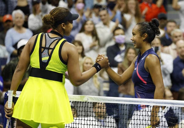 Leylah Fernandez of Canada shakes hands with Naomi Osaka of Japanafter defeating her in 3 sets in Arthur Ashe Stadium in the third round of the 2021 US Open Tennis Championships at the USTA Billie Jean King National Tennis Center on Friday, September 3, 2021 in New York City.  NYP20210903132 JOHNxANGELILLO