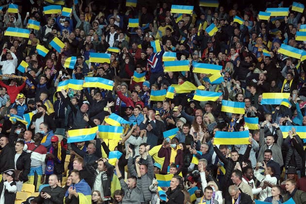 KYIV, UKRAINE - SEPTEMBER 4, 2021 - Fans of Ukraine hold national flag boards on the stands before the FIFA World Cup, WM, Weltmeisterschaft, Fussball Qatar 2022 Qualification Round UEFA Group D match against France at the NSC Olimpiyskiy, Kyiv, capital of Ukraine. Ukraine vs France in European Qualifiers match in Kyiv  Copyright: xHennadiixMinchenkox