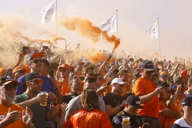 ZANDVOORT- Fans celebrate after the Dutch Grand Prix won by Max Verstappen at the Zandvoort circuit. ANP VINCENT JANNINK Grand Prix xVIxANPxSportx xxANPxIVx