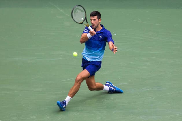 (210913) -- NEW YORK, Sept. 13, 2021 -- Novak Djokovic of Serbia hits a return during the men s singles final between Novak Djokovic of Serbia and Daniil Medvedev of Russia at the 2021 US Open in New York, the United States, Sept. 12, 2021. (Photo by Xinhua) (SP)U.S.-NEW YORK-TENNIS-US OPEN-MEN S SINGLES-FINAL MichaelxNagle 