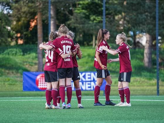 Nuernberg, Germany, September 12 Players of Nuernberg celebrate their goal during the 2. Womens Bundesliga match between 1. FC Nuernberg and SG 99 Andernach at Sports Park Valznerweiher in Nuernberg, Germany. 2. Womens Bundesliga - 1. FC N?rnberg v SG 99 Andernach 