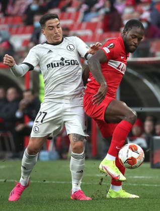 MOSCOW, RUSSIA â€“ SEPTEMBER 15, 2021: FC Legia Warsaw s Josue (L) and FC Spartak Moscow s Victor Moses in action in their 2021 22 UEFA Europa League Group C football match, at Otkrytie Arena Stadium. Sergei Fadeichev TASS  TS110849
