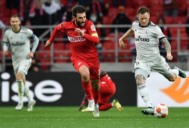 6651463 15.09.2021 Spartak s Georgi Dzhikiya, left, and Legia s Mattias Johansson struggle for a ball during the Europa League soccer match between Spartak Moscow and Legia Warsaw, in Moscow, Russia. Pavel Bednyakov Sputnik Russia Soccer Europa League Spartak - Legia  e58d3f208407fe2f