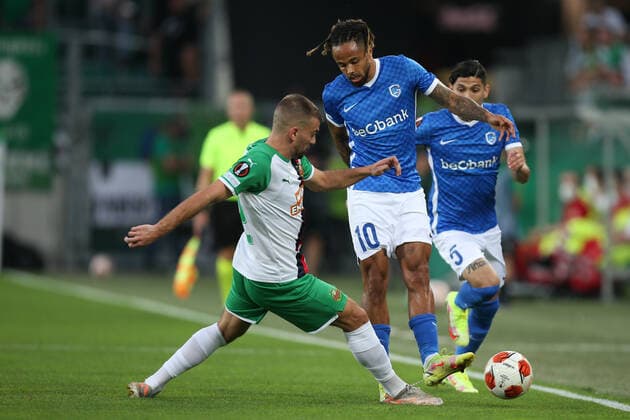 SOCCER - UEFA EL, Rapid vs Genk VIENNA,AUSTRIA,16.SEP.21 - SOCCER - UEFA Europa League, group stage, SK Rapid Wien vs KRC Genk. Image shows Filip Stojkovic (Rapid) and Theo Bongonda (Genk).  GEPAxpictures xDavidxBitzan