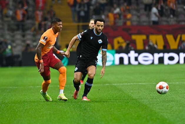 Patrick van Anholt (L) of Galatasaray and Felipe Anderson of Lazio during the UEFA Europa League Group E match between Galatasaray and Lazio at Turk Telekom Stadium in Istanbul , Turkey on September 16, 2021. 
