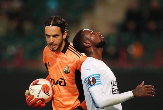 MOSCOW, RUSSIA â€“ SEPTEMBER 16, 2021: FC Lokomotiv Moscow s goalkeeper Guilherme Marinato (L) and FC Olympique de Marseille s Gerson in their 2021 22 UEFA Europa League Group E football match, at RZD Arena Stadium. Sergei Savostyanov TASS  TS110AAB