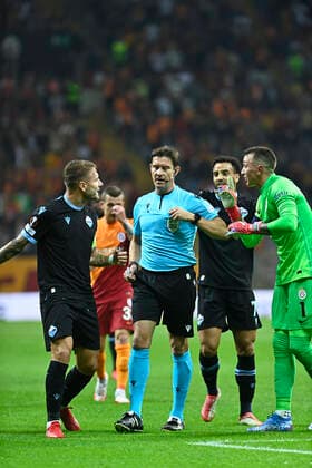Referee Matej Jug and Goalkeeper Fernando Muslera of Galatasaray and Ciro Immobile of Lazio during the UEFA Europa League Group E match between Galatasaray and Lazio at Turk Telekom Stadium in Istanbul , Turkey on September 16, 2021. 