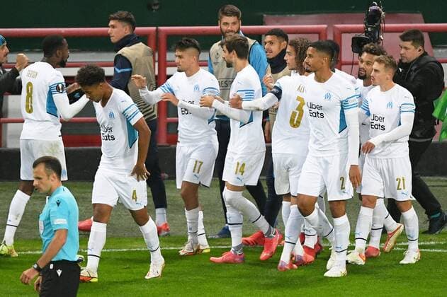 6652400 16.09.2021 Marseille s players celebrate the team s goal during the Europa League soccer match between Lokomotiv Moscow and Olympique de Marseille, in Moscow, Russia. Ramil Sitdikov Sputnik Russia Soccer Europa League Lokomotiv - Marseille  af658dfbc3edc74e