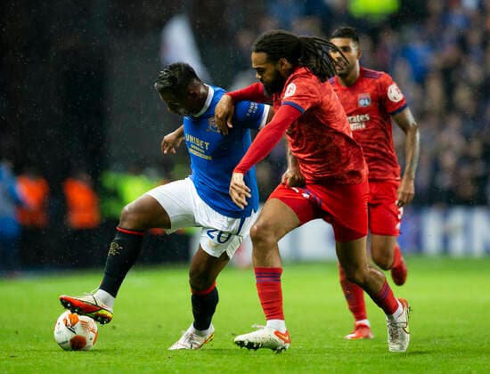 Football - 2021 2022 UEFA Europa League - Group A, Round One - Glasgow Rangers vs Lyon - Ibrox stadium - Thursday 16th September 2021 Alfredo Morelos of Rangers vies with Jason Denayer of Olympique Lyonnais 