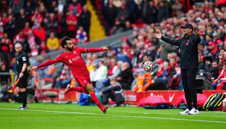 Mandatory Credit: Photo by Javier Garcia Shutterstock (12345464v) Mohamed Salah of Liverpool fails to prevent the ball from going out next to Liverpool Manager Jurgen Klopp Liverpool v Burnley, Premier League, Football, Anfield Stadium, Liverpool, UK - 21 Aug 2021 EDITORIAL USE ONLY No use with unauthorised audio, video, data, fixture lists, club league logos or live services. Online in-match use limited to 120 images, no video emulation. No use in betting, games or single club league player publications. Liverpool v Burnley, Premier League, Football, Anfield Stadium, Liverpool, UK - 21 Aug 2021 EDITORIAL USE ONLY No use with unauthorised audio, video, data, fixture lists, club league logos or live services. Online in-match use limited to 120 images, no video emulation. No use in betting, games or single club league player publications.  Copyright: xJavierxGarcia Shutterstockx 12345464v