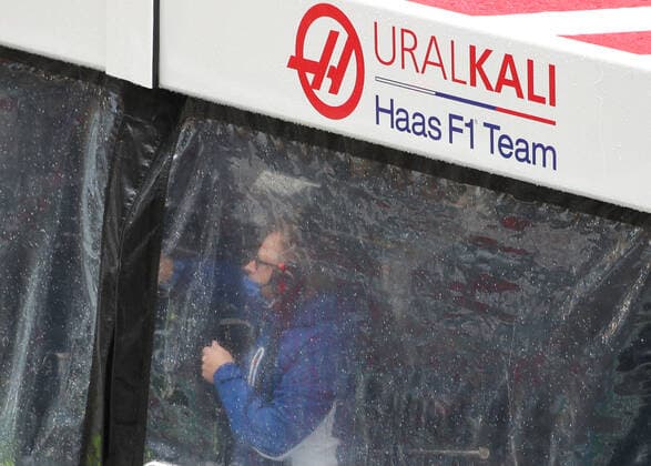 SOCHI, RUSSIA - SEPTEMBER 25, 2021: A member of Uralkali Haas F1 Team is seen at the Sochi Autodrom racing circuit hosting the 2021 Formula One Russian Grand Prix. The third practice session of the 2021 F1 Russian Grand Prix has been canceled amid heavy rains in Sochi. Sergei Fadeichev TASS  TS111DDE